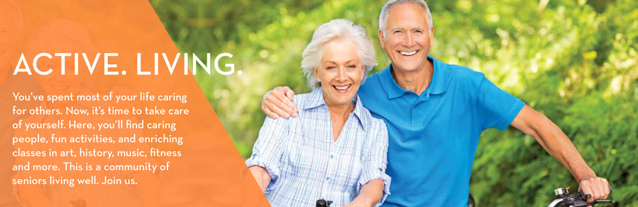 Senior man and woman smiling with bicycles outdoors