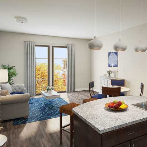 Interior of Bucks County Apartment living room with sofa small table, blue rug and counter space with two stools