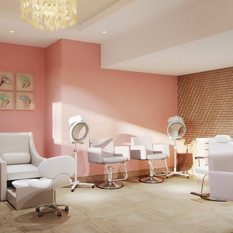 Heartis Buckhead’s Brighton Salon and Spa with pink walls, salon chairs and décor