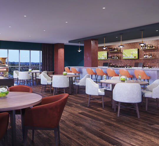 Heartis Buckhead’s Tower Lounge with a bar, tables and windows with a view